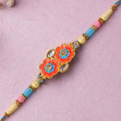 Ornate Rakhi with Butterfly Bloom Charm, multicolor stones and bead line for Gift Use
