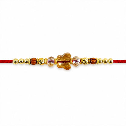 Crystal Flower Cluster Rakhi with Faceted Stones, Golden Accents and Red Thread