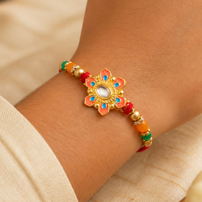 Orange and Teal Floral Kundan Pendant Rakhi with Pastel Beads