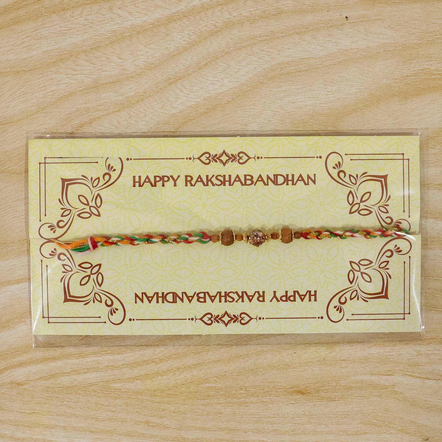Vibrant Stone Rakhi with Color Beads, Gold Accents and Festive Thread Beauty