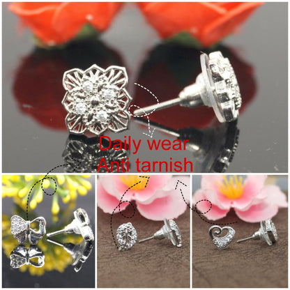 Silver leaf-shaped zircon stud earrings with sparkling stones detail