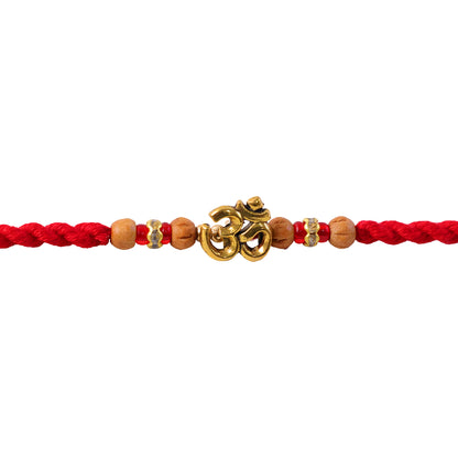 Navy-Red Thread Rakhi with Golden Om Pendant and Beaded Accents