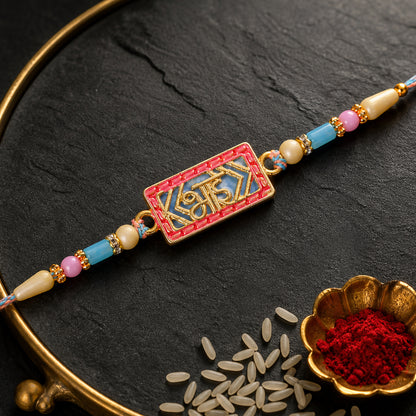 Classic Rakhi showcasing Shubh Plaque, crystal accents and plaque look for Gift Use