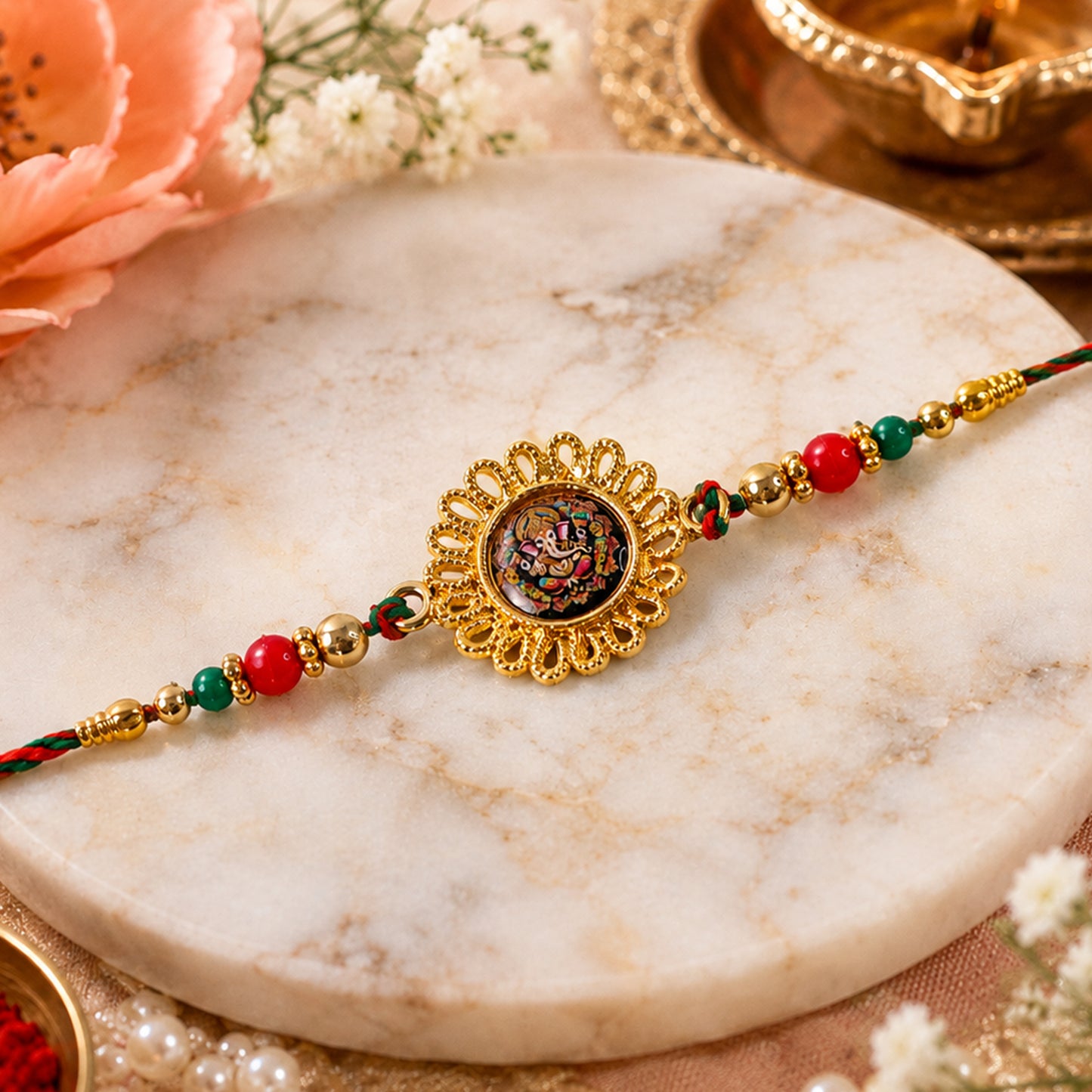 Hand Painted Ganesha Medallion Rakhi with Red Beads
