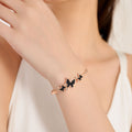 Rose Gold Round Dial Watch with Black Butterfly Shape Bracelet for Women