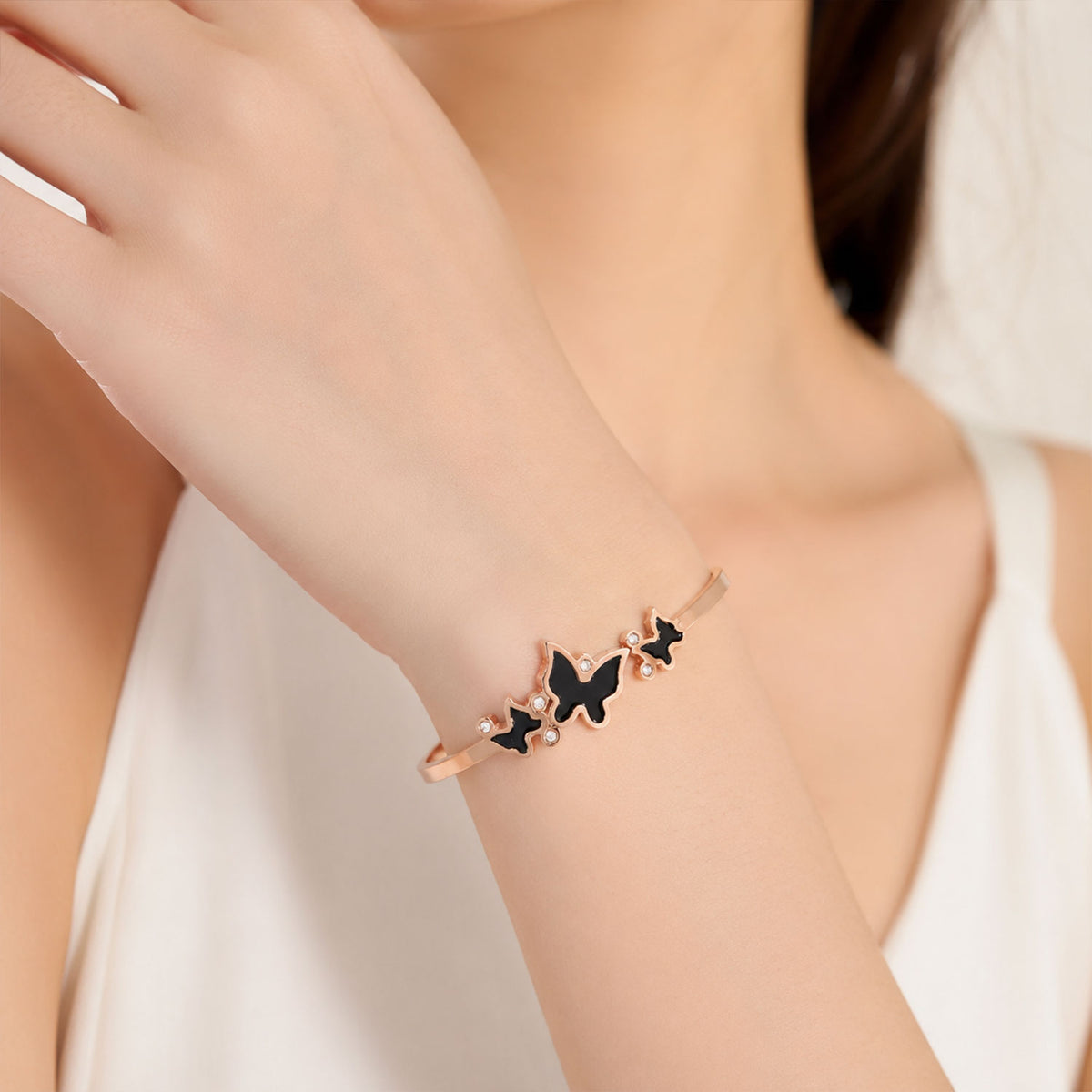 Rose Gold Round Dial Watch with Black Butterfly Shape Bracelet for Women