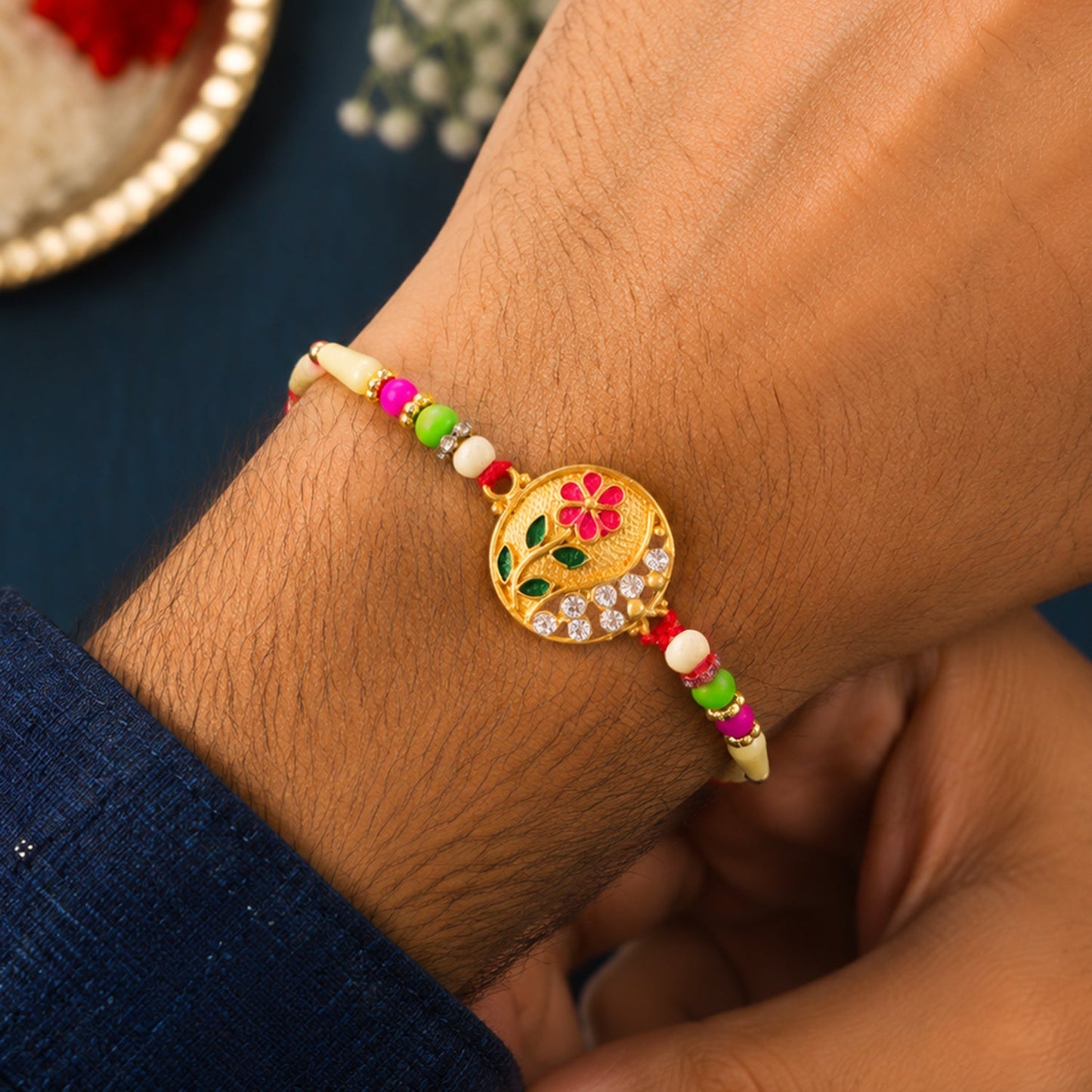 Flower Design Rakhi with Red and Green Beads Festive Elegance (10pcs)