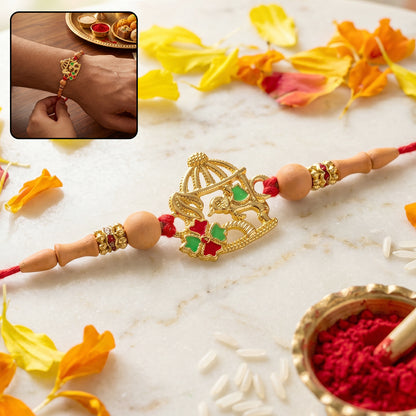 Golden Bow and Arrow Rakhi for Boys with Red Thread and Beads