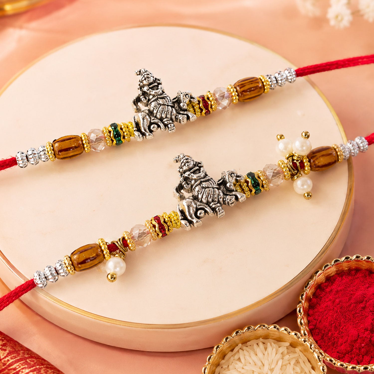 Silver Ganesha Couple Rakhi Set with Amber Crystal Beads and Pearl Lumba Charm Gift