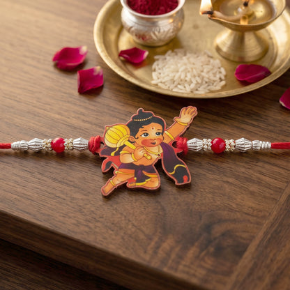 Bal Hanuman Cartoon Rakhi with Red Beads and Silver Chain