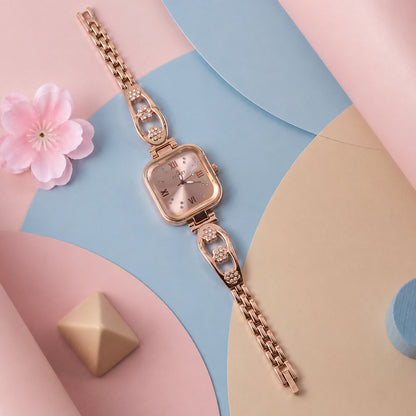 Stylish rose gold analog wrist watch featuring a unique square dial for women.
