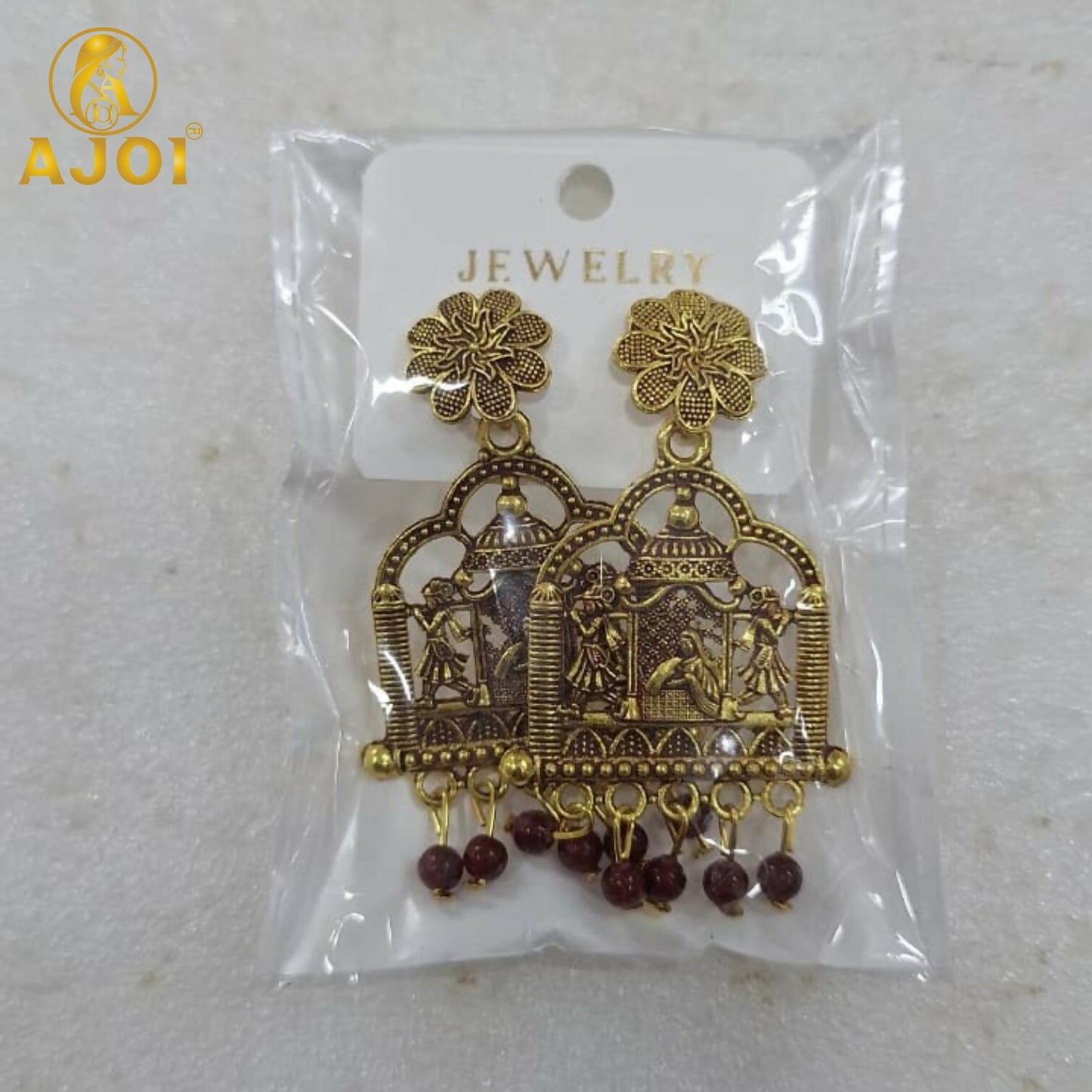 Pair of antique temple doli earrings with detailed floral studs