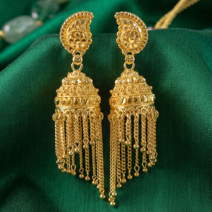 Jhumka earrings highlighting gold plating and pearl accents