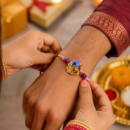 Side view of Curved Peacock Purple Blue Designer Rakhi showing intricate thread