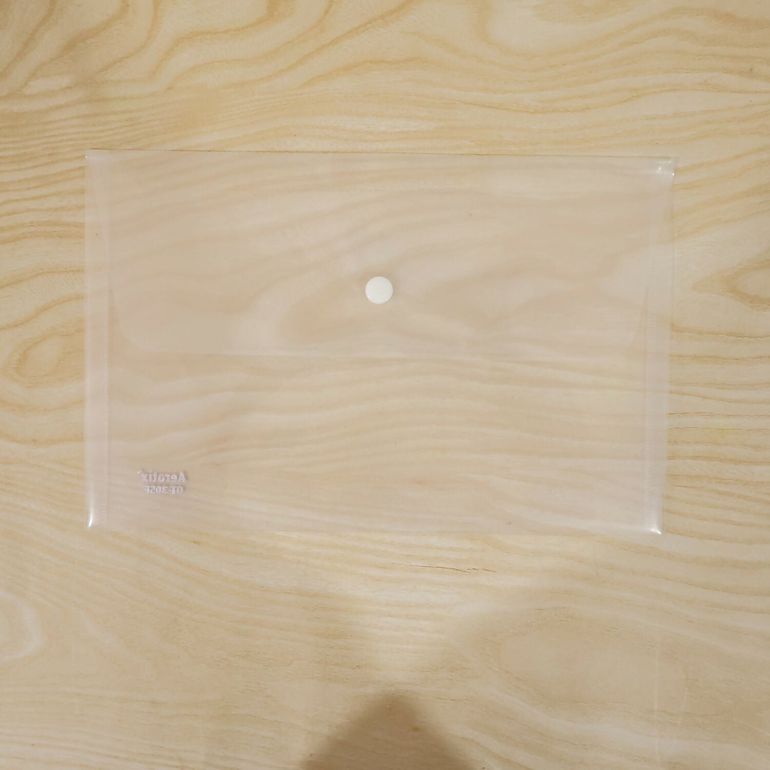 Multiple frosted white clear folders arranged neatly