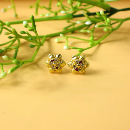Premium crafted traditional floral gold earrings with detailed motifs