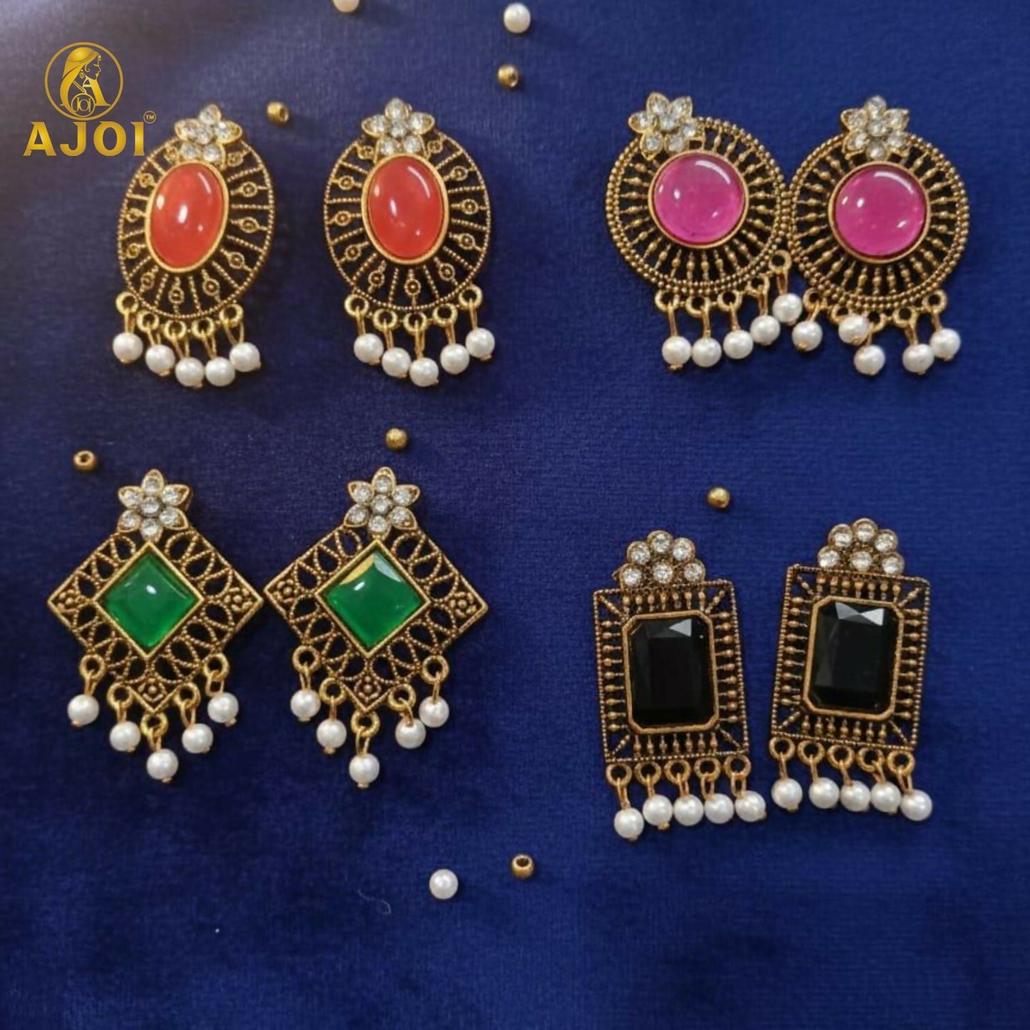 Green stone and pearl drop earrings with antique gold finish