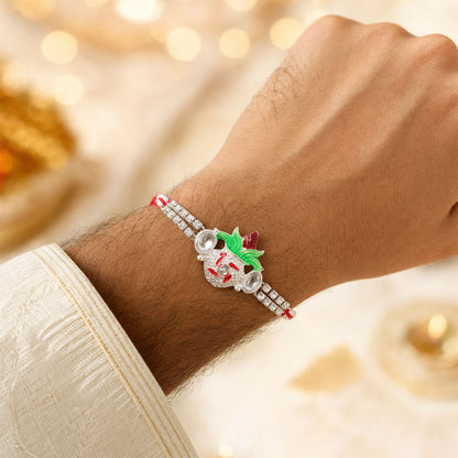 Ornate Rakhi with Leaf Floral Charm, multicolor stones and chain look for Festive Use