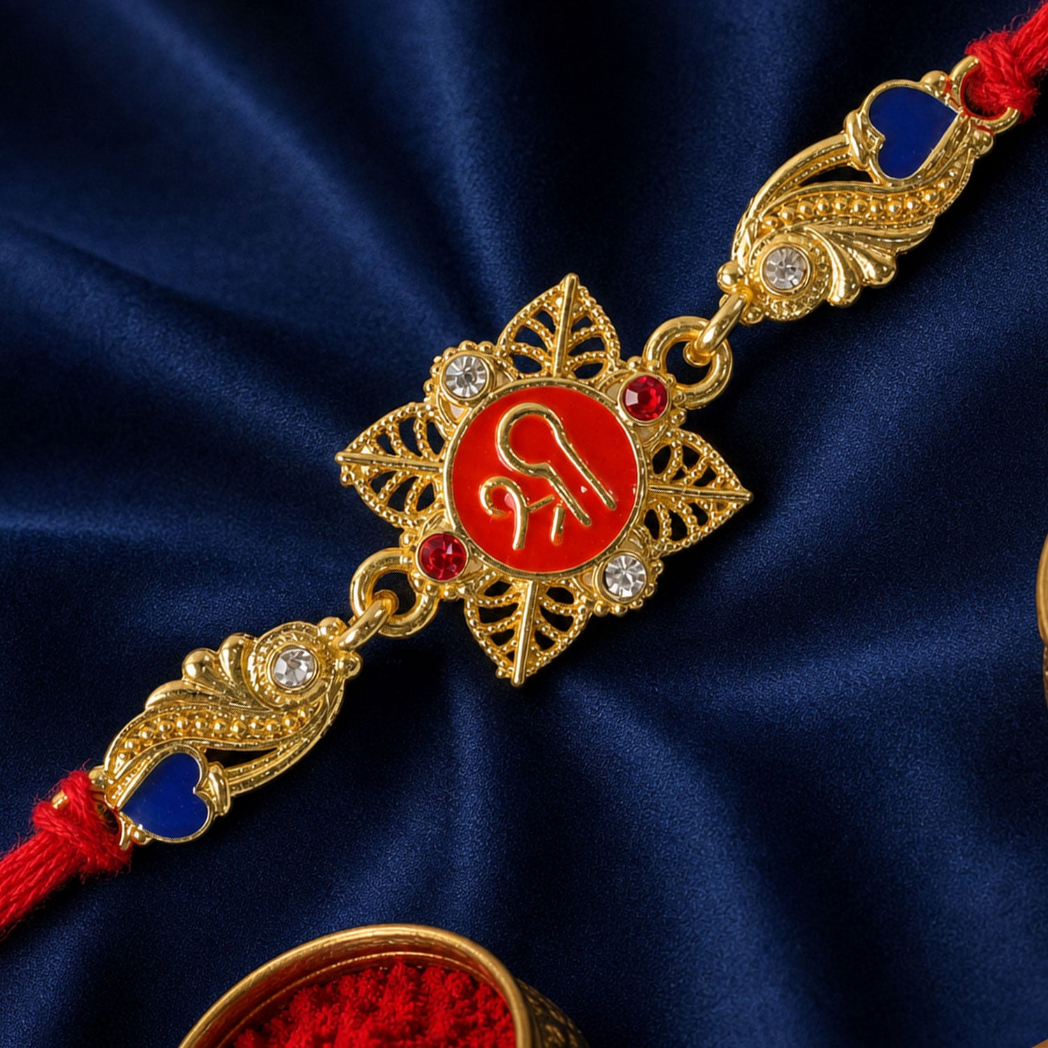 Festive Rakhi featuring Shri Plaque, leaf detail and thread style for Product Display