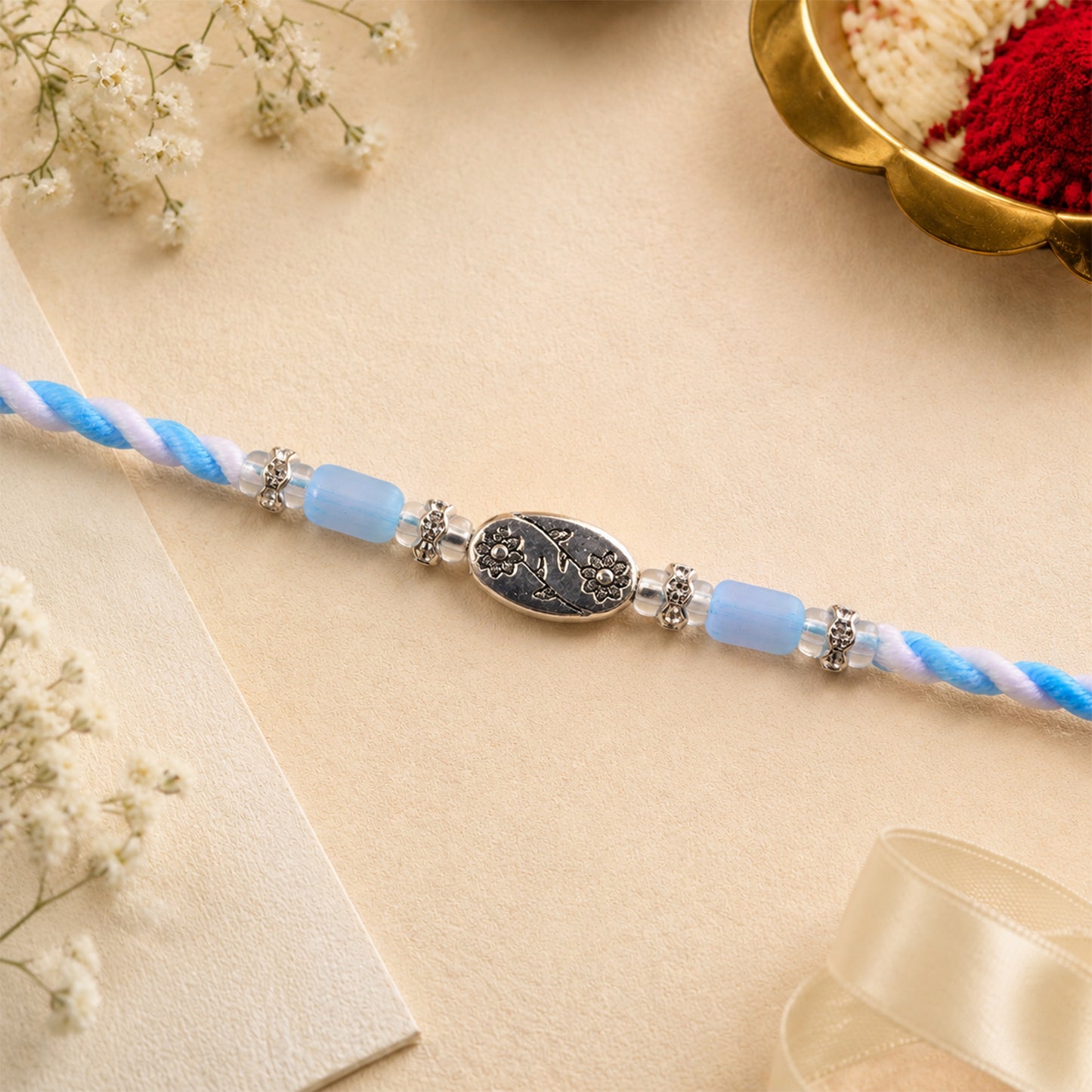 Blue Silver Stone Rakhi with Elegant Bracelet Style and Premium Festive Shine