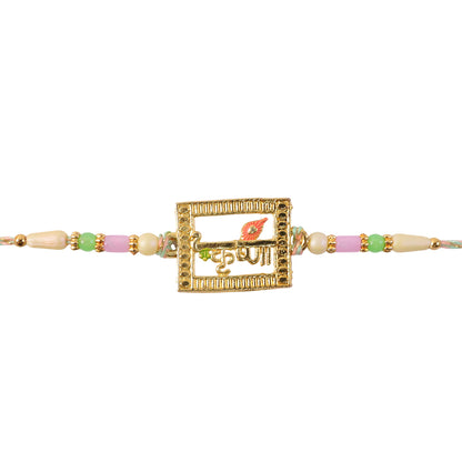Krishna Script Pendant Rakhi with Red Flower Accent