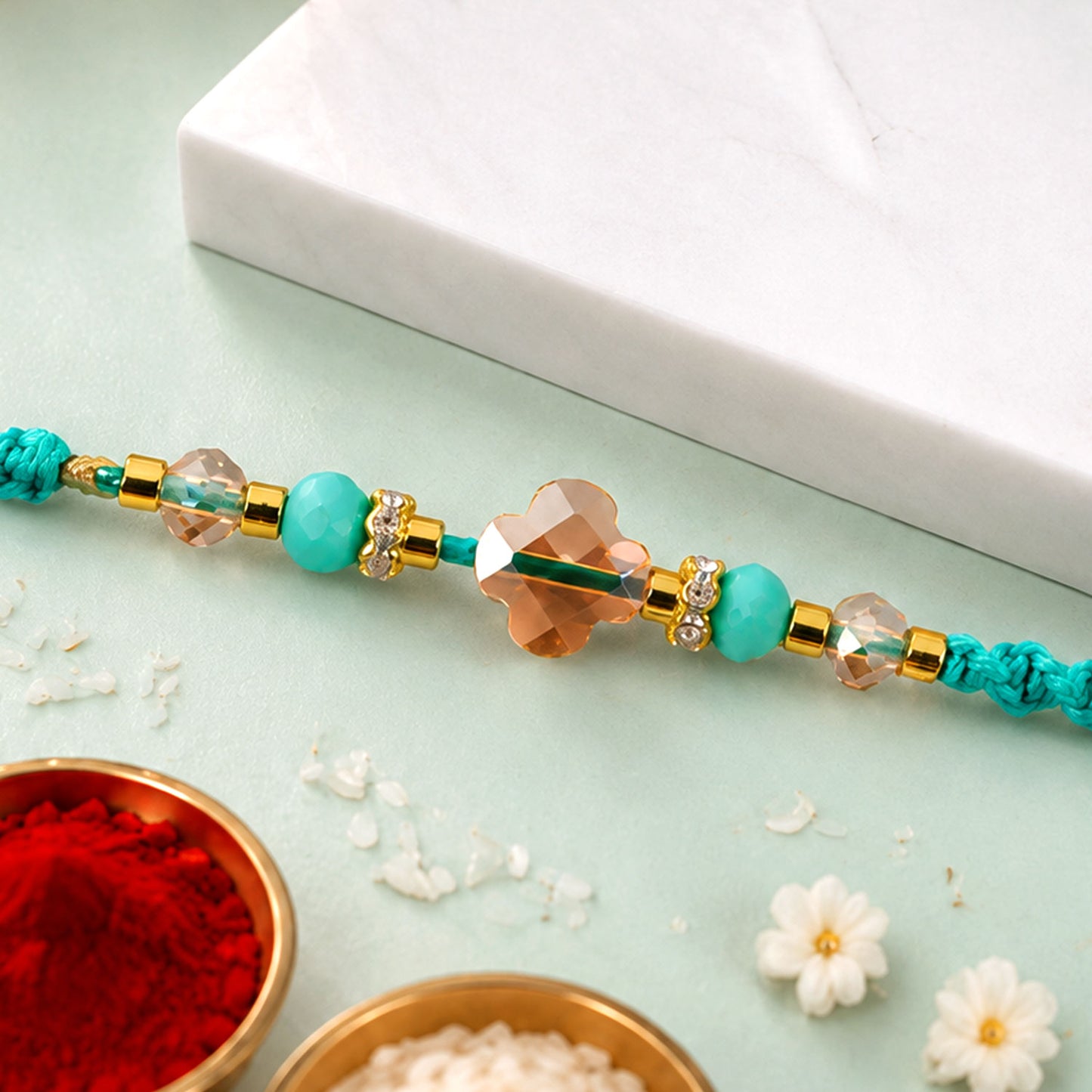 Elegant Stone Work Rakhi with Red Thread, Bead Detailing and Premium Celebration Look