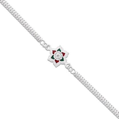 Close-up of silver thread Rakhi symbolizing brother's strength and pride