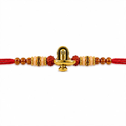 Lord Shiva Shivling Trishul Devotional Rakhi with Golden Temple Centre and Red Thread
