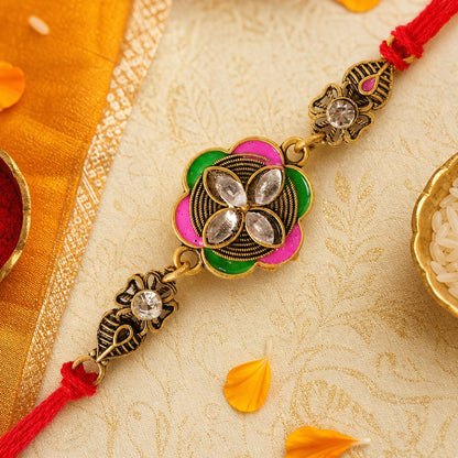 Ornate Rakhi with Floral Medallion, multicolor stones and chain look for Gifting