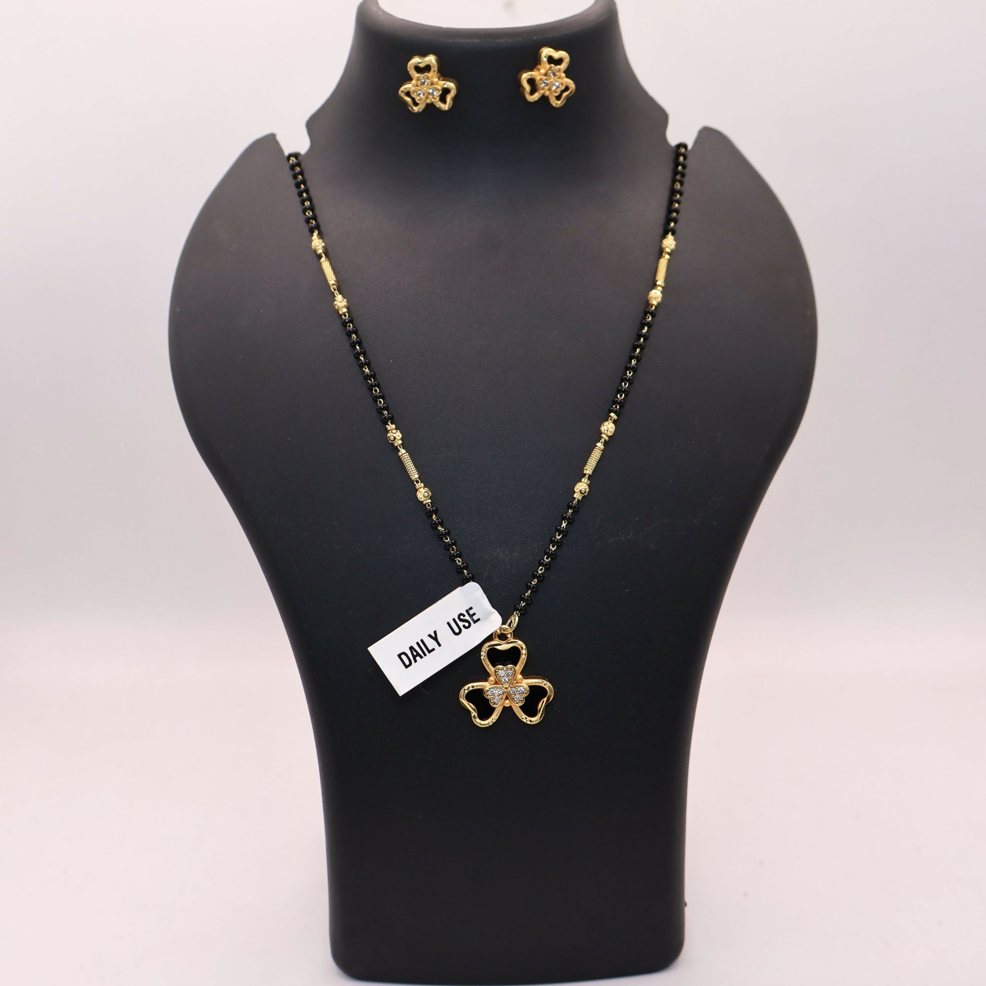Gold-Plated AD Floral Mangalsutra Set with Clover Stud Earrings for women