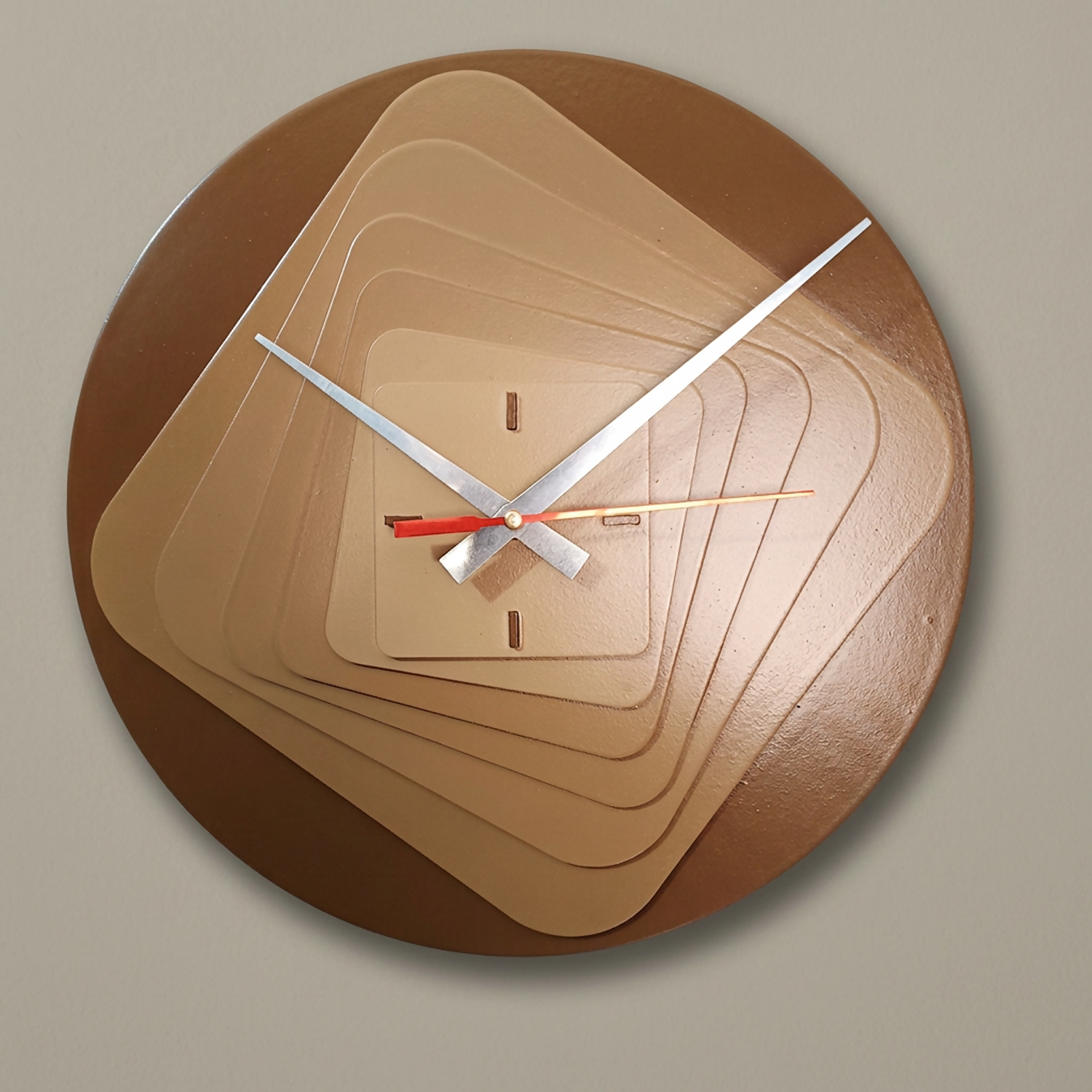 Close-up of layered geometric pattern on wooden wall clock