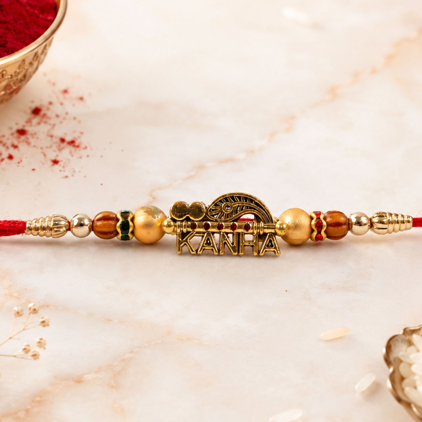 Kanha Krishna Devotional Rakhi with Peacock-Flute Style Golden Centre and Red Beads