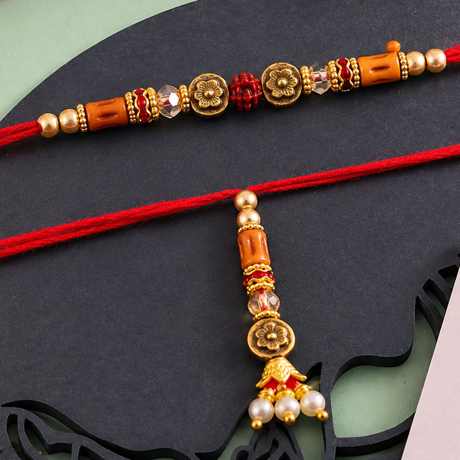 Graceful Beaded Minimal Design Bhai Bhabhi Rakhi with Beads and Charm for Gifting