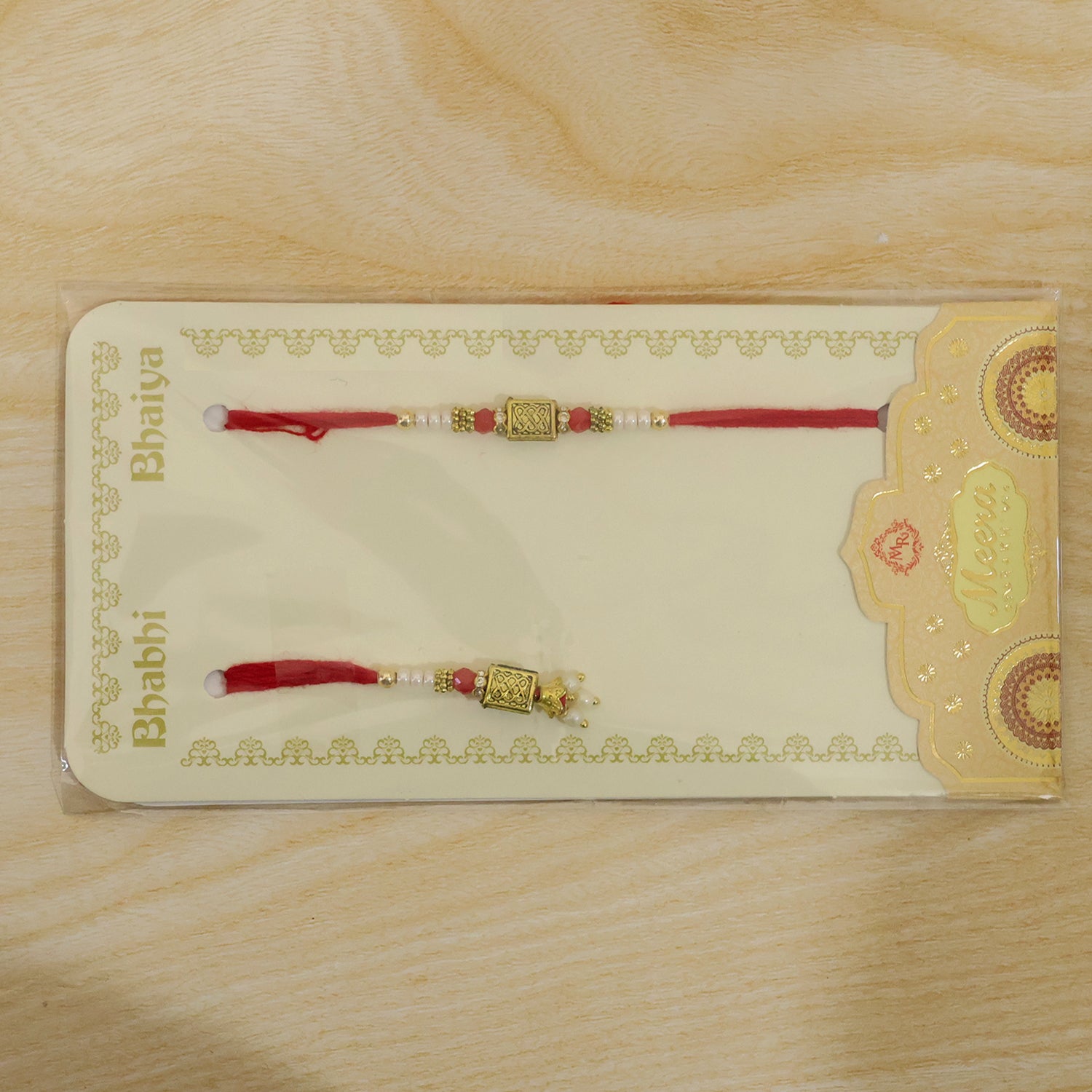 Geometric Rectangle Bhai Bhabhi Rakhi with Rectangular Emblem and Pearls for Gifting