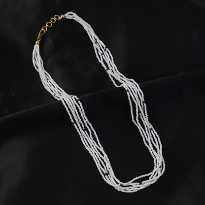 Traditional beaded pearl necklace with detailed craftsmanship