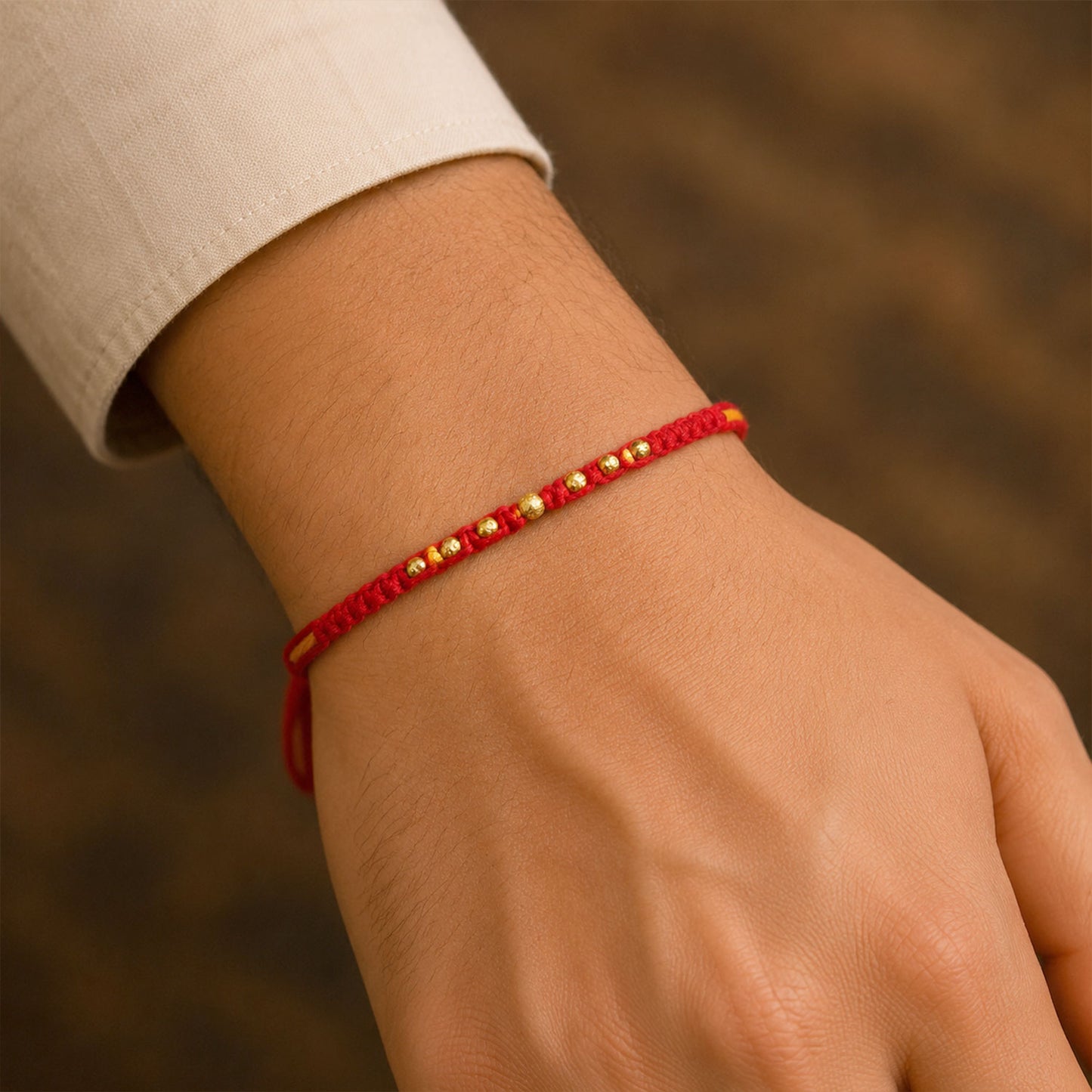 Minimal Red Stone Rakhi with Simple Beauty, Fine Beads and Festive Thread Detail