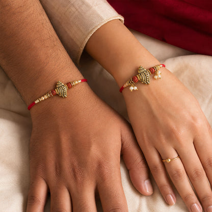 Antique Paisley Couple Rakhi Set with Rudraksha Beads and Pearl Lumba Charm Design