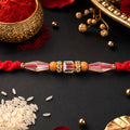 Red Thread Rakhi with Champagne Crystal Beads and Wooden Bead Accents