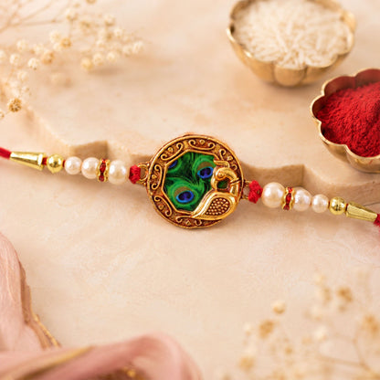 Shop Peacock Feather Rakhi with Pearl Bead Accents Red Thread (5pcs)