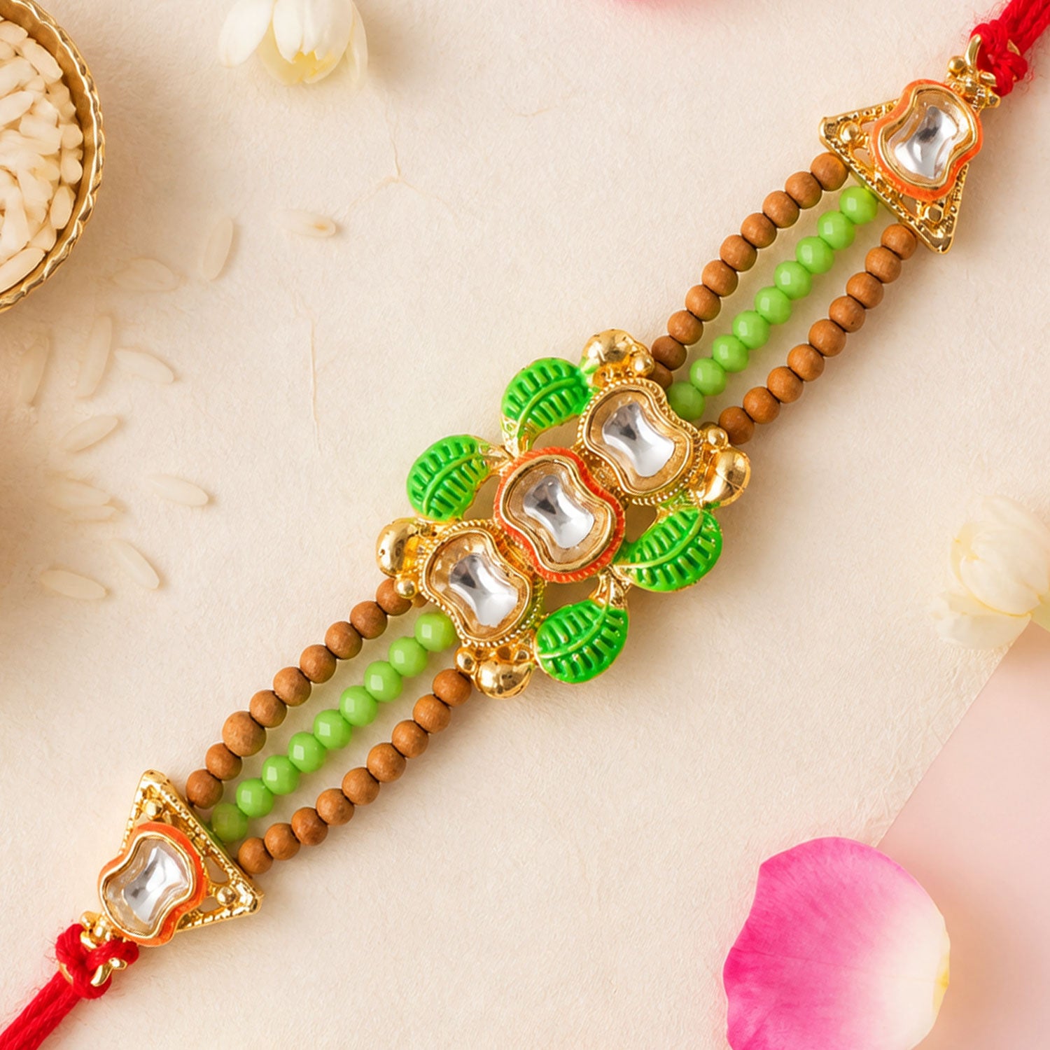 Traditional Triple Kundan & Green Leaf Motif Rakhi with Wooden & Green Beaded Strand