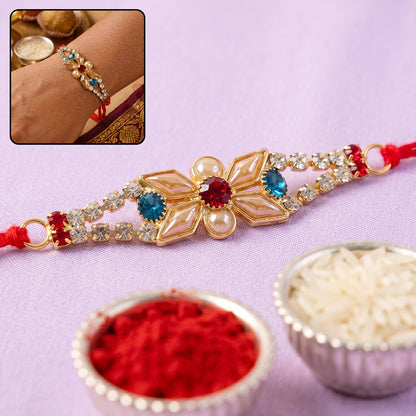Pastel Floral Kundan Rakhi with Blue Stone and Pearl Center