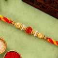 Pearl Bead Rakhi – Soft Festive Shades and Designer Look