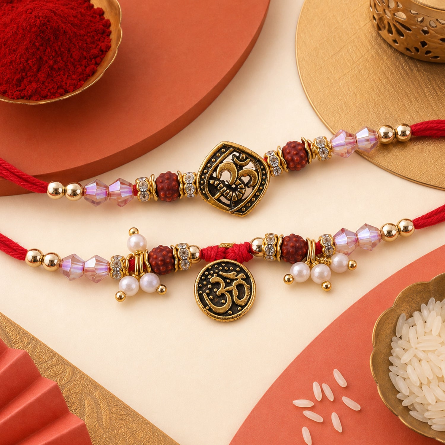 Graceful OM Symbol Bhai Bhabhi Rakhi with OM Medallion and Pearl Tassel for Gifting