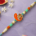 Traditional Rakhi with Om Symbol Charm and leaf detail in thread style for Gift Use