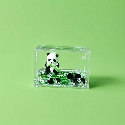 Mini panda paper weight holding papers on office desk