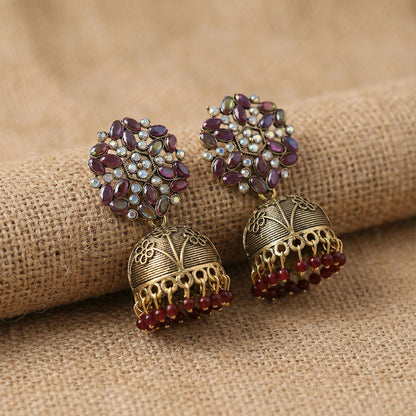 Close-up of Purple Stone Floral Jhumka Earrings