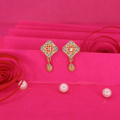 Close-up of gold plated square stud earrings featuring sparkling AD and CZ stones