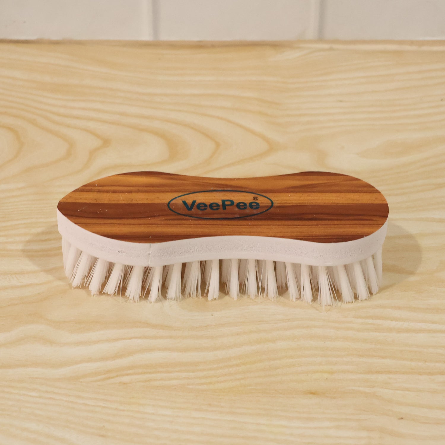 Cloth Washing Brush on wooden background
