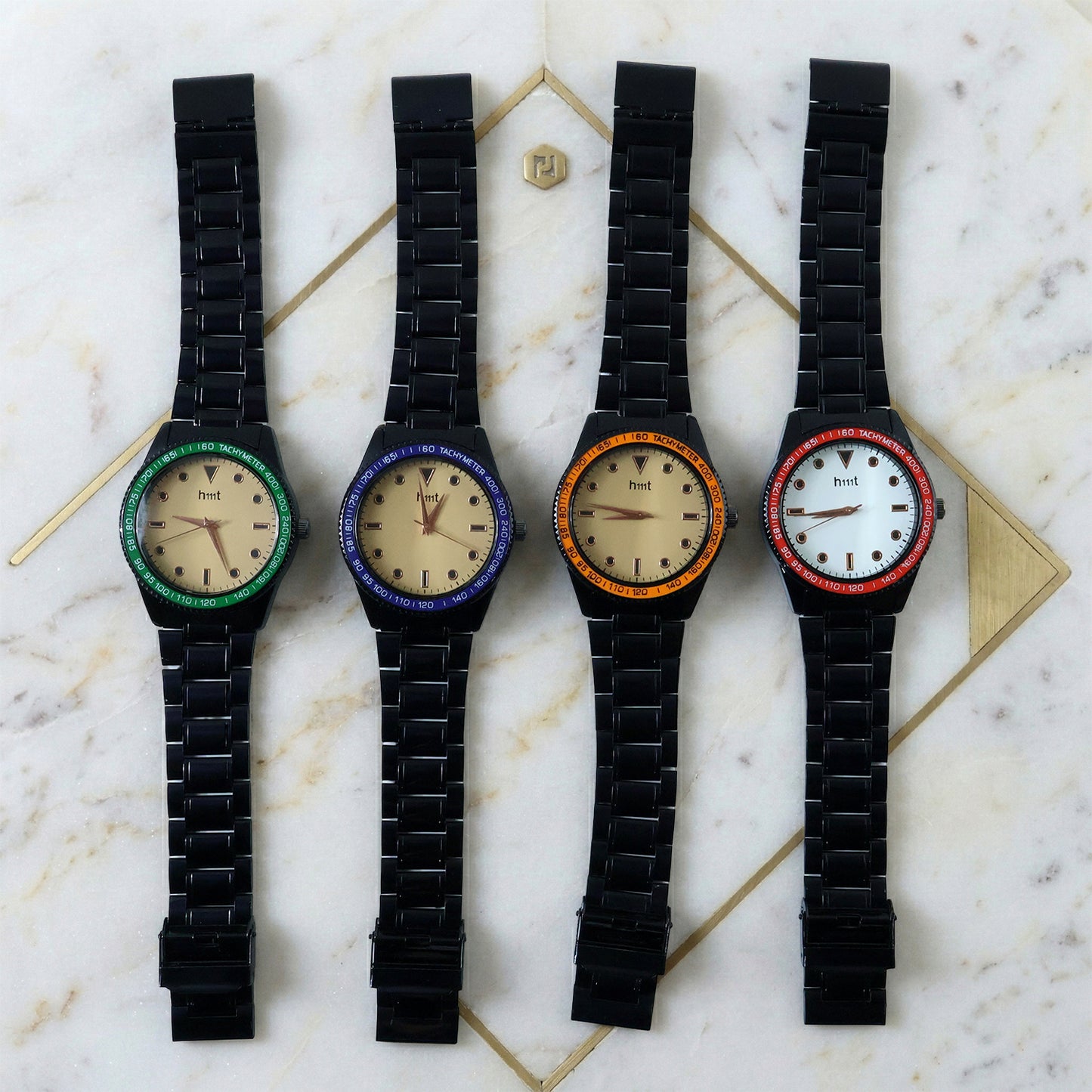 Classic analog wrist watch with black dial and tachymeter bezel