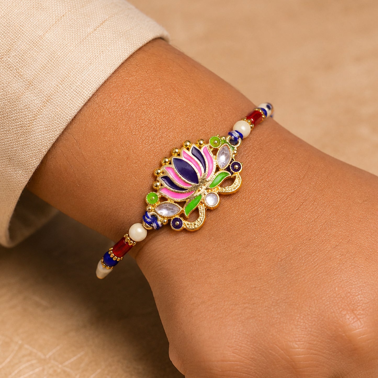 Lotus Flower Enamel Pendant Rakhi with Navy Pearl Beads